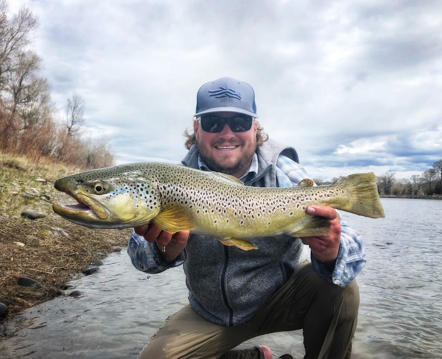 Montana Trout Company owner with large trout