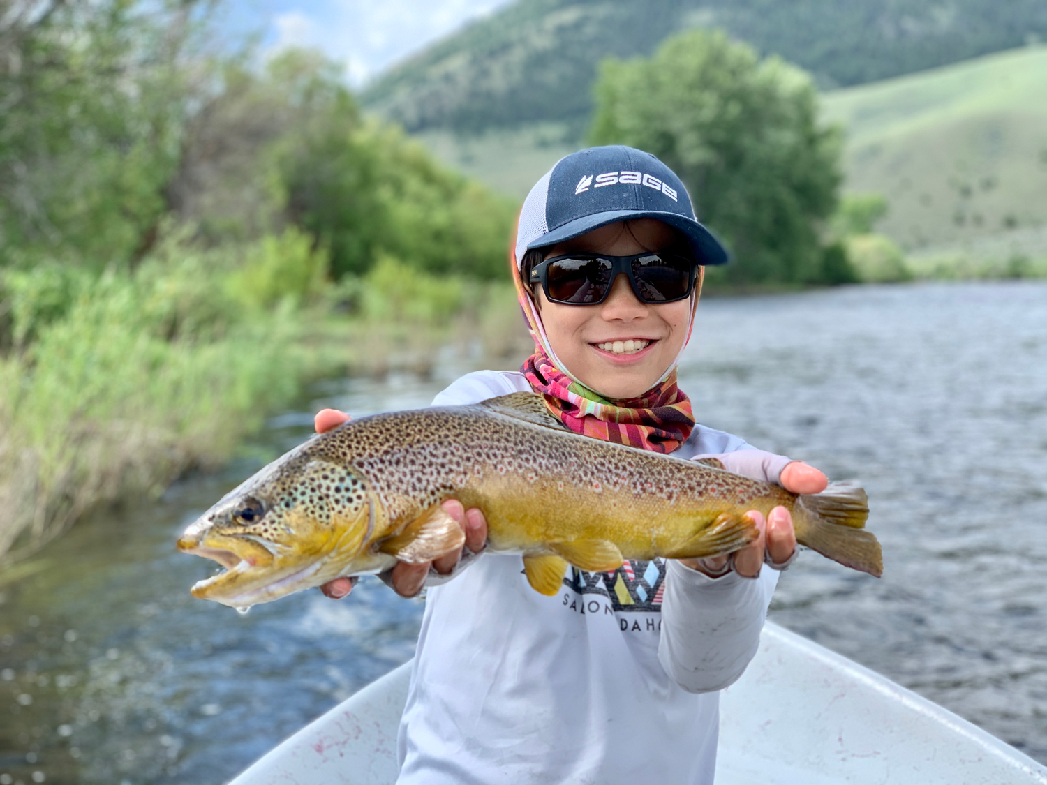 Younger boy with fish